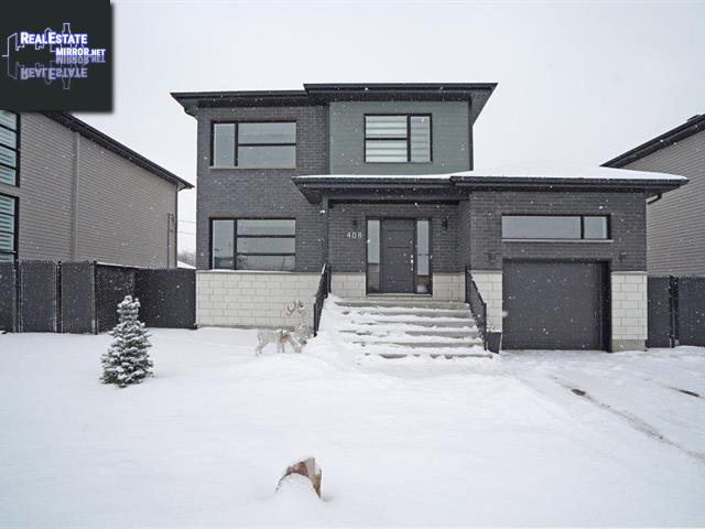 Property 408 Av. Marier main img