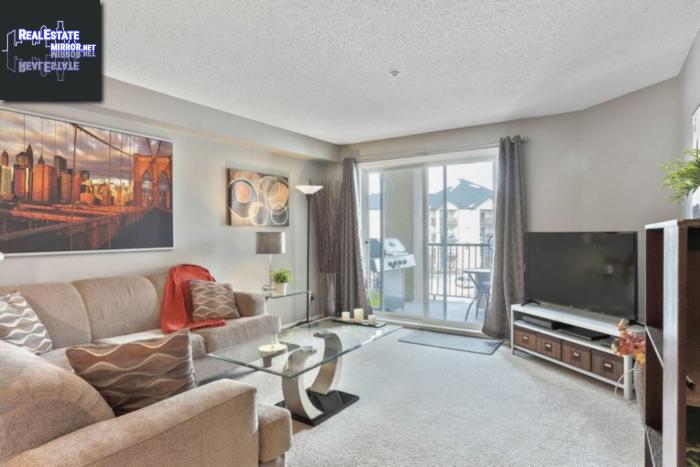 Property #7303 304 Mackenzie Wy Sw main img